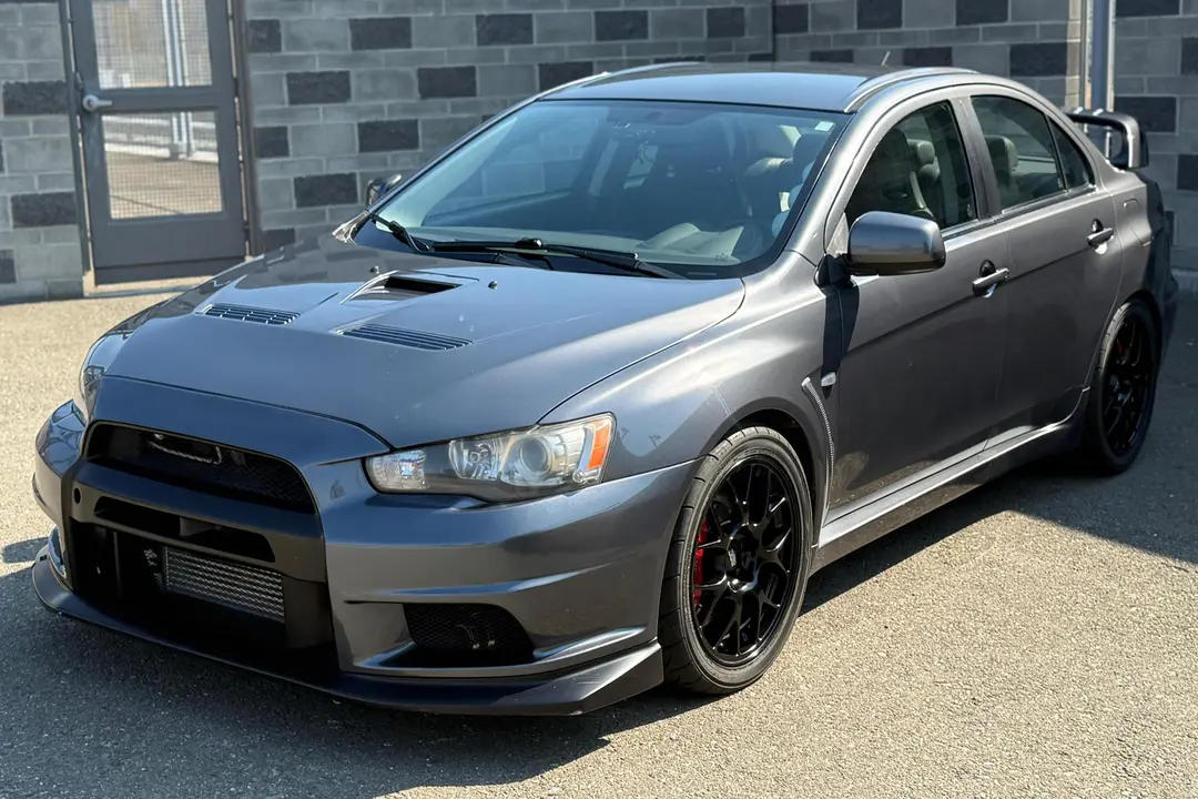 2008 Mitsubishi Lancer Evolution, sold Jan 2026