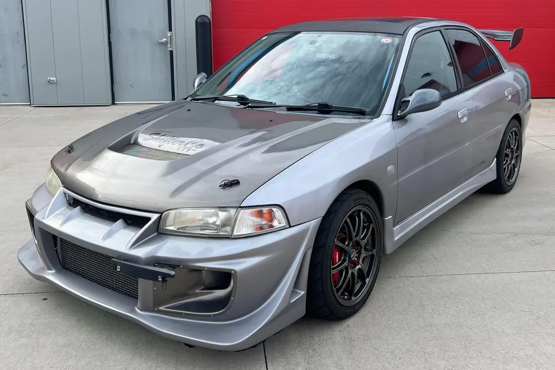 1995 Mitsubishi Lancer Evolution, sold May 2025